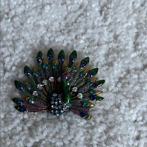 Vibrant Peacock Brooch with Jewel Tones